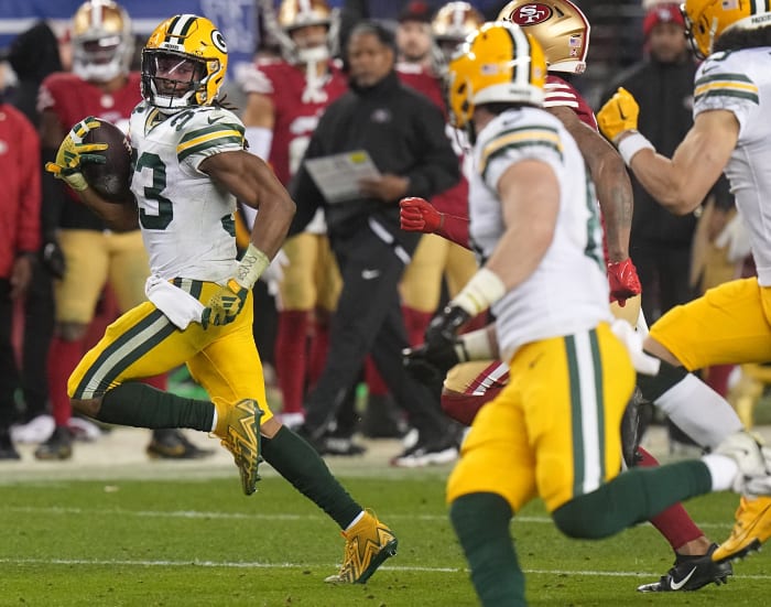 Green Bay Packers running back Aaron Jones (33) picks up 53 yards on a run during the fourth quarter of their NFC divisional playoff game against the San Francisco 49ers Saturday, Jan. 20, 2024, at Levi Stadium in Santa Clara, Calif. The 49ers beat the Packers 24-21.